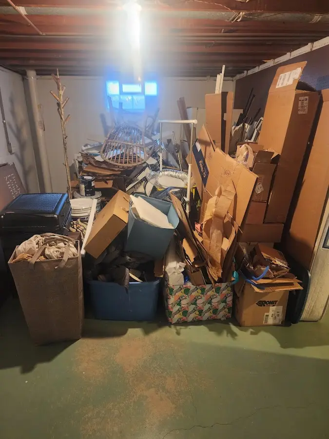 Roll-off dumpster container at job site for 2 Yard Dumpster Rental in West Windsor